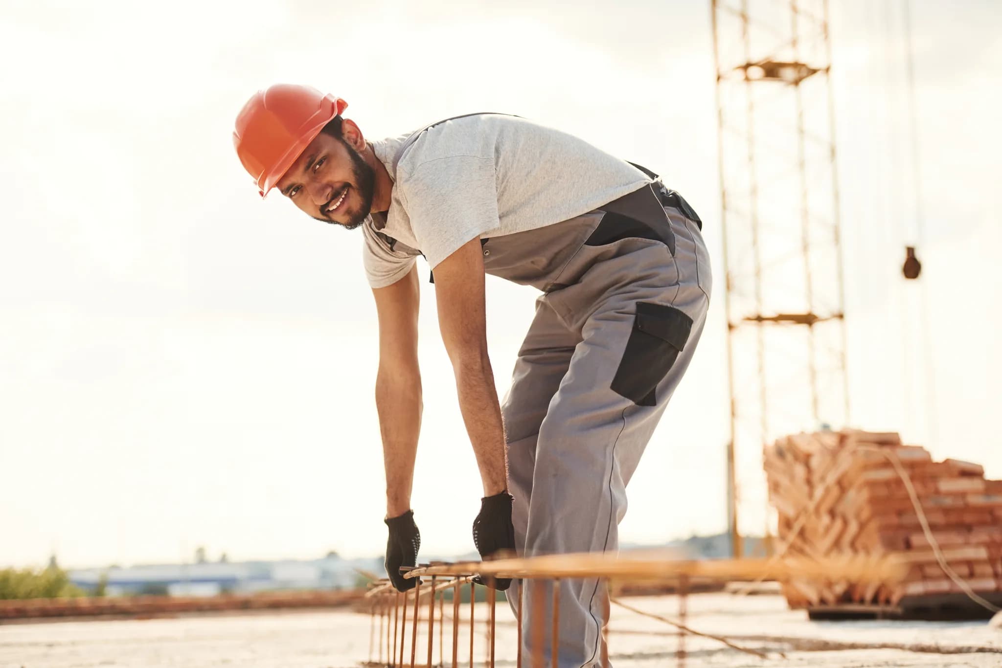 A worker wearing sensor technology for biomechanical risk assessment